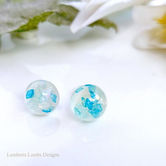 Handmade stud earrings with blue glass