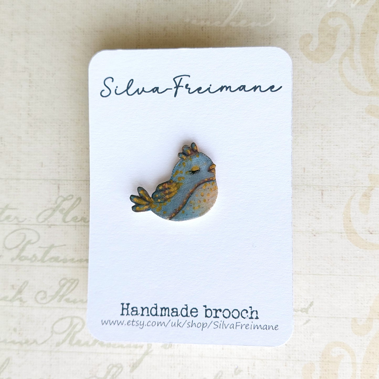 Artsy hand painted bird brooch