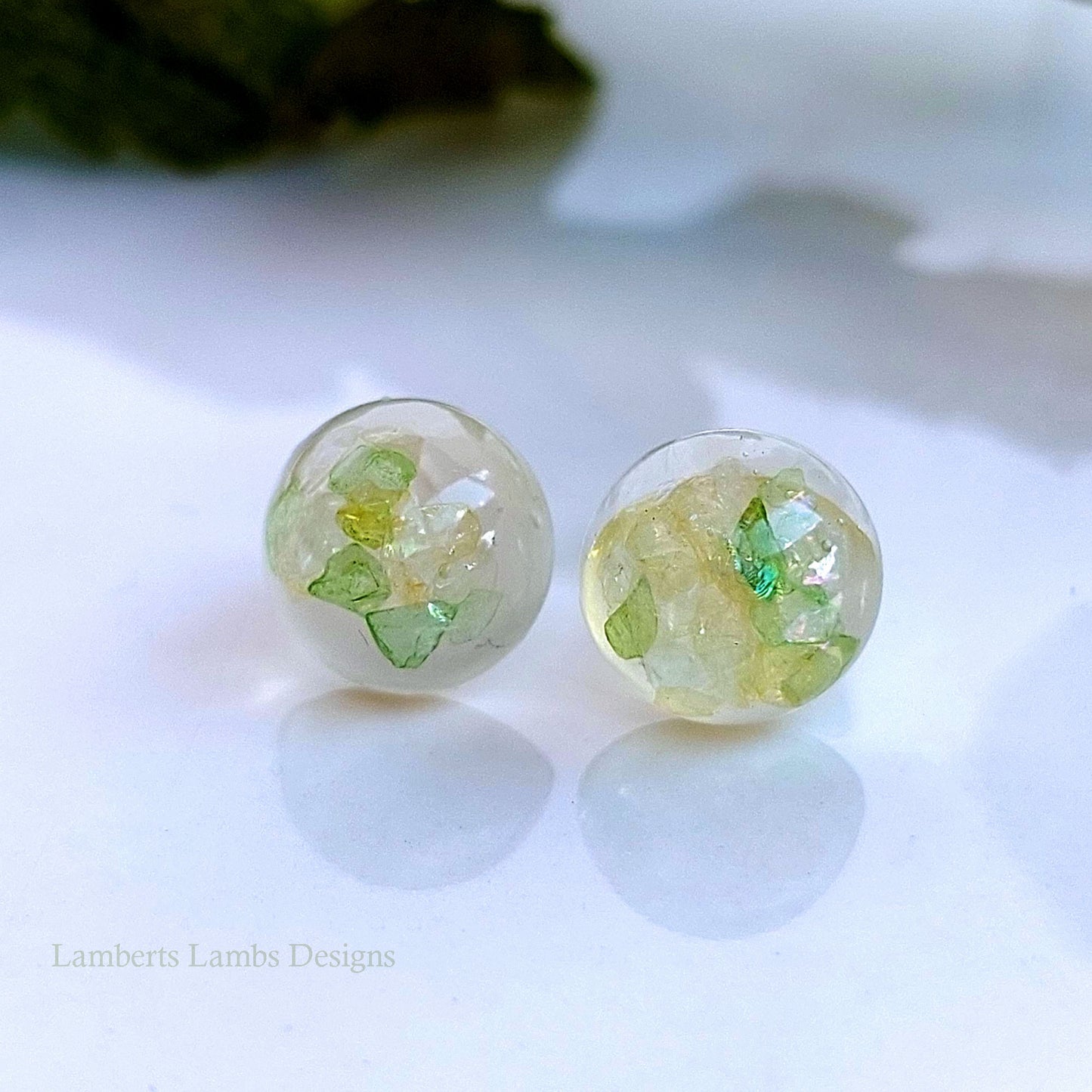 Handmade stud earrings with green glass