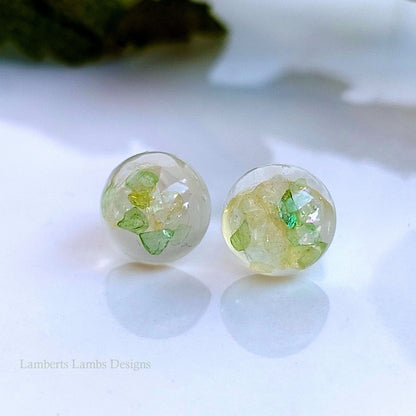 Handmade stud earrings with green glass