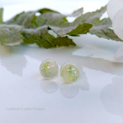 Handmade stud earrings with green glass