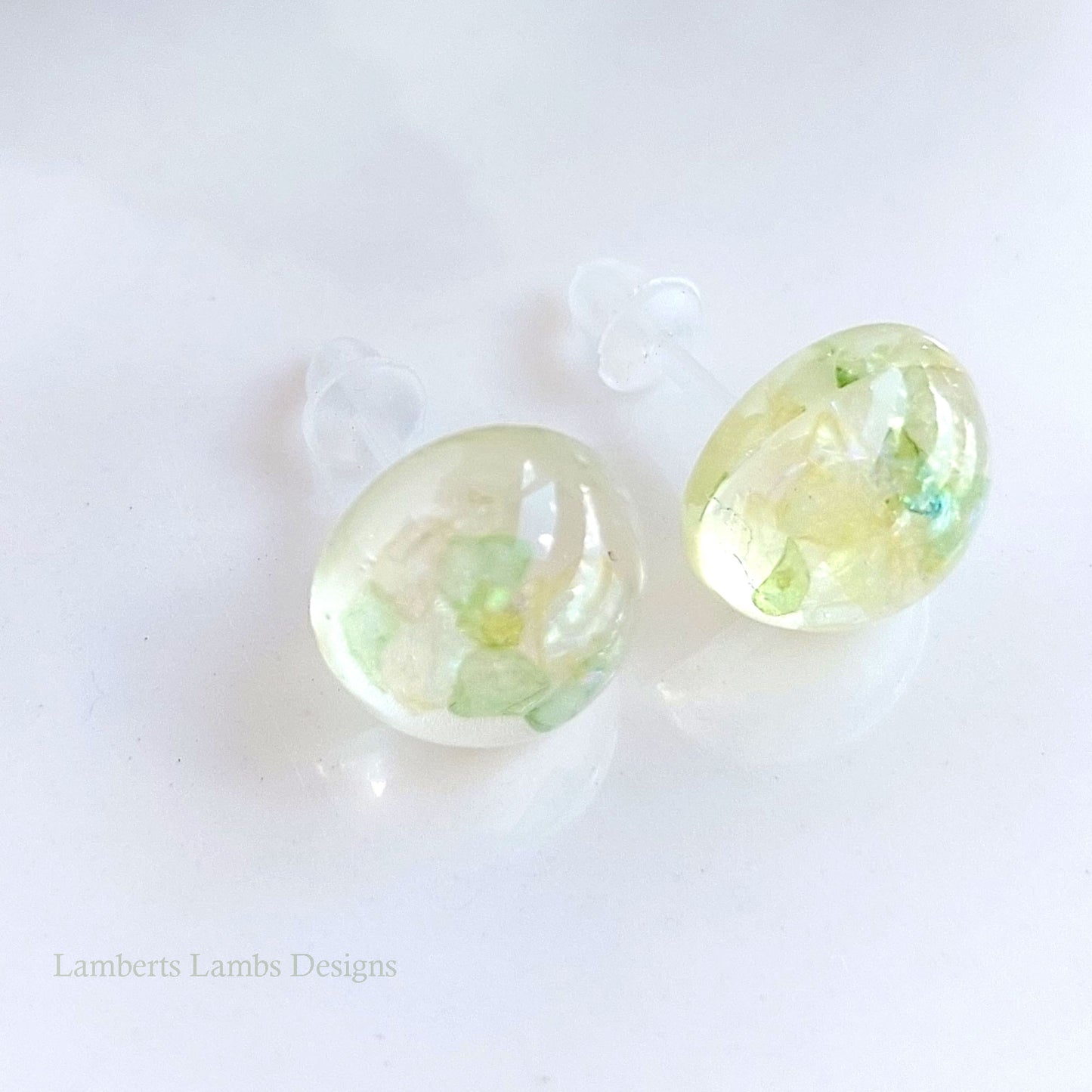 Handmade stud earrings with green glass