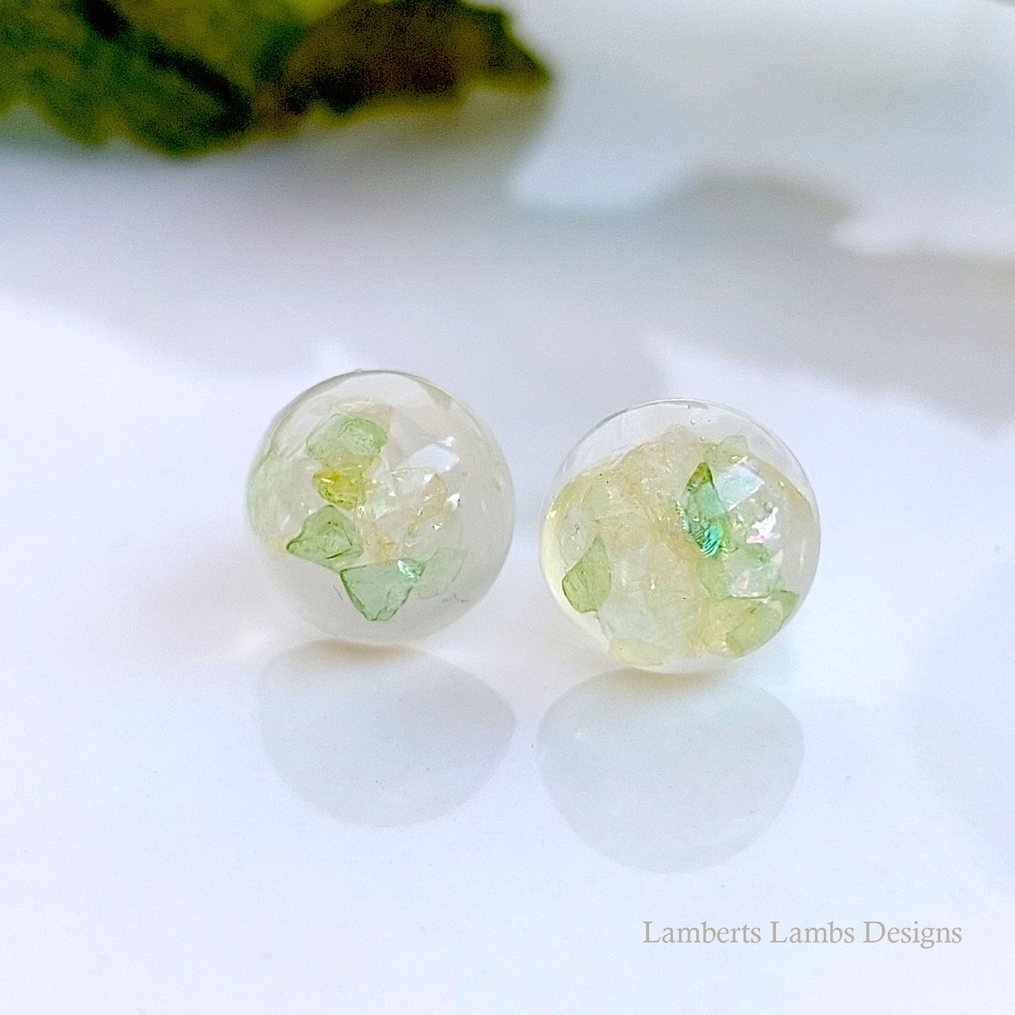 Handmade stud earrings with green glass