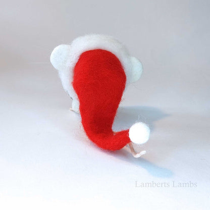 Adorable needle felted Christmas mouse in a Santa hat holding a wreath decorated with cookies/ White wool felted mouse keepsake decoration