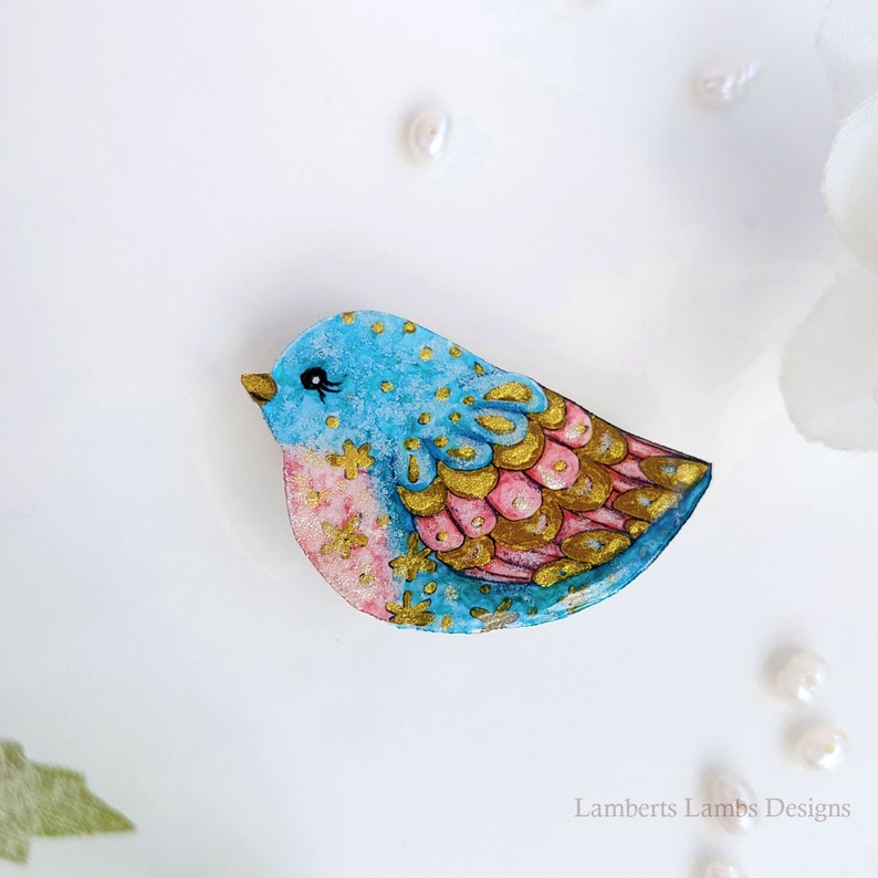 Artsy hand painted blue, pink and gold bird brooch