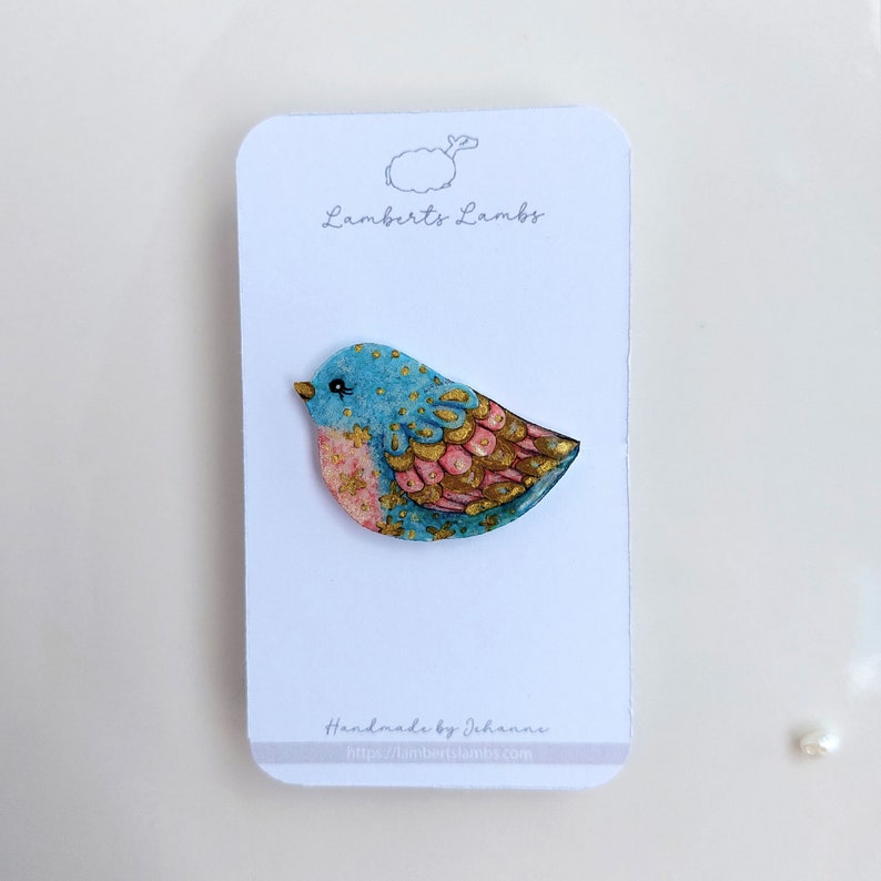 Artsy hand painted blue, pink and gold bird brooch