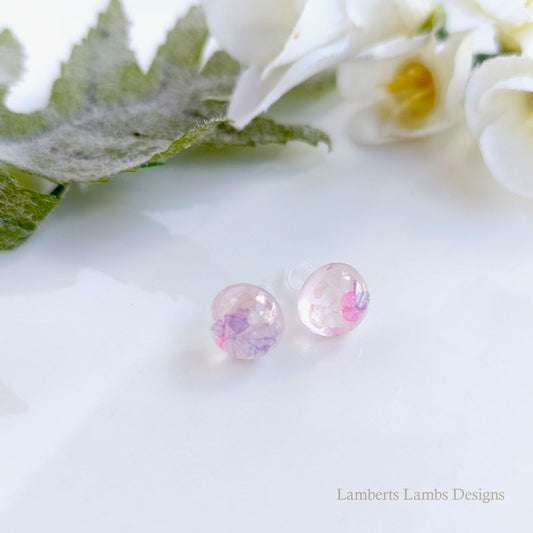 Handmade stud earrings with pink and purple glass
